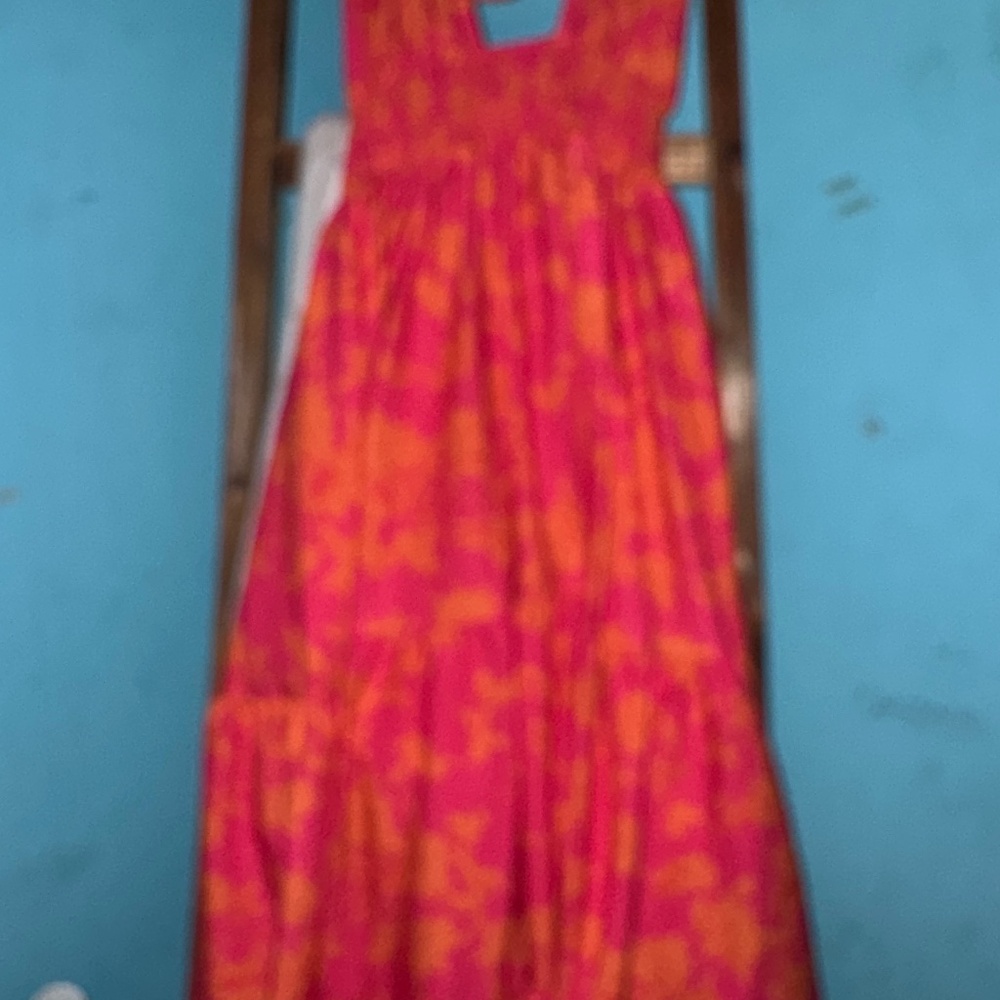 Long pink dress with orange flowers